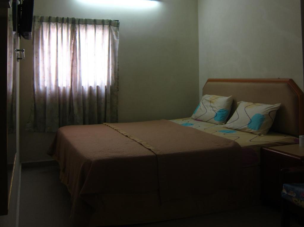 Skudai Baru Hotel Джохор-Бару Номер фото