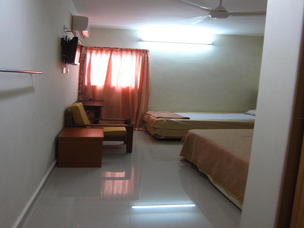 Skudai Baru Hotel Джохор-Бару Номер фото