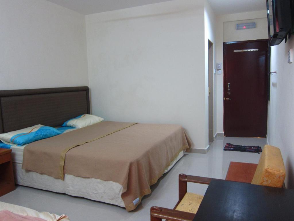 Skudai Baru Hotel Джохор-Бару Номер фото